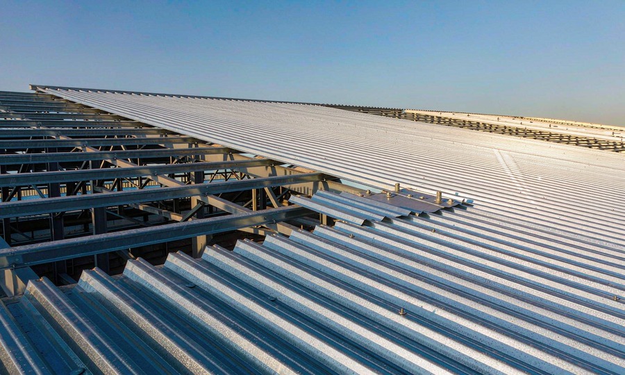 Roof Sheet Geometry: Purlin Spacing, Lap Lengths and the Pitch That Decides the Rest