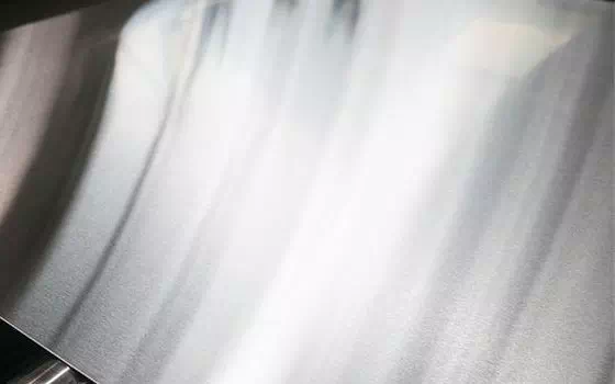 Why is nitrogen recommended for laser cutting of stainless steel?